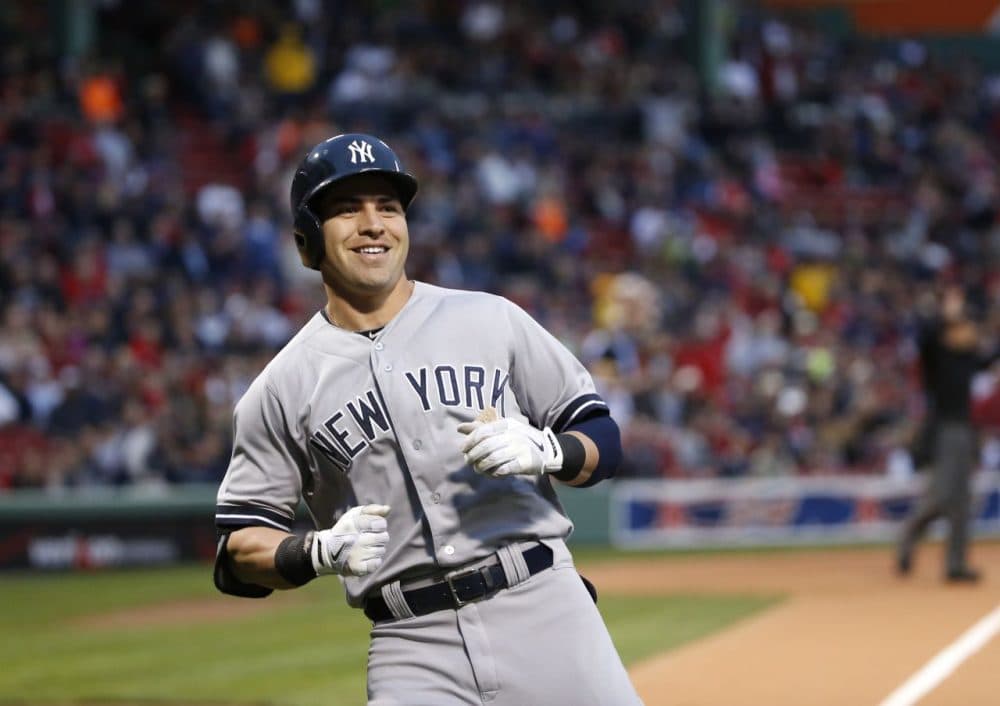 New York Yankees' Jacoby Ellsbury smiles after running to home during the first inning.(AP/Elise Amendola)