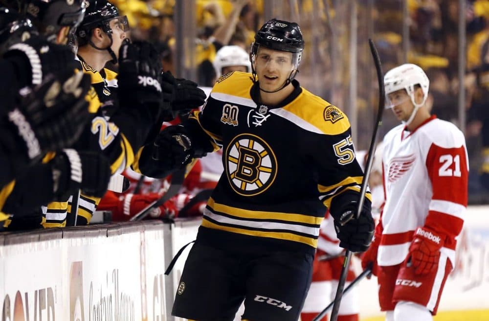 Boston Bruins' Justin Florek is congratulated after scoring a goal in the first period of Game 2 of a first-round NHL hockey playoff series against the Detroit Red Wings. (Winslow Townson/AP)

