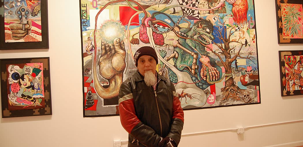 Bert Crenca at his exhibition “Puzzled: Ode Owed to Channing.&quot; (Greg Cook)