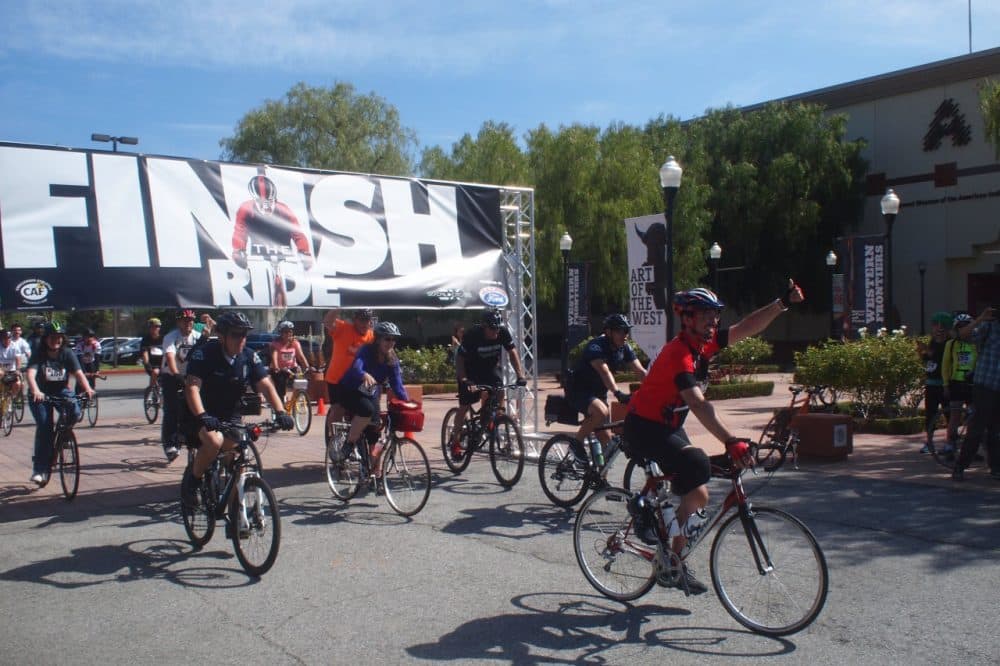 Damian, in red, leads a group of cyclists at the 'Finish the Ride' event. (Kevin Ferguson/Only A Game)