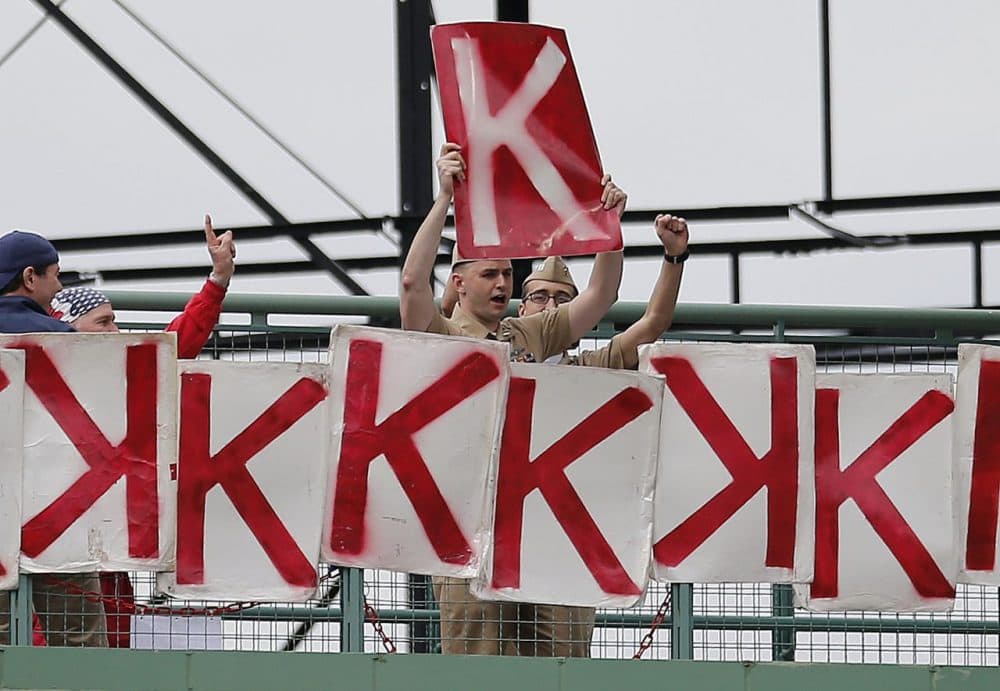 Fans display Ks representing strikeouts by Red Sox pitcher Jon Lester during the eighth inning. (Michael Dwyer/AP)