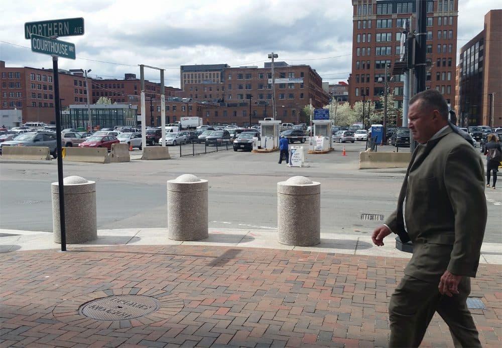 Former Probation Commissioner John O'Brien leaves the Moakley Courthouse Monday, May 5 after his corruption trial began. (State House News Service)