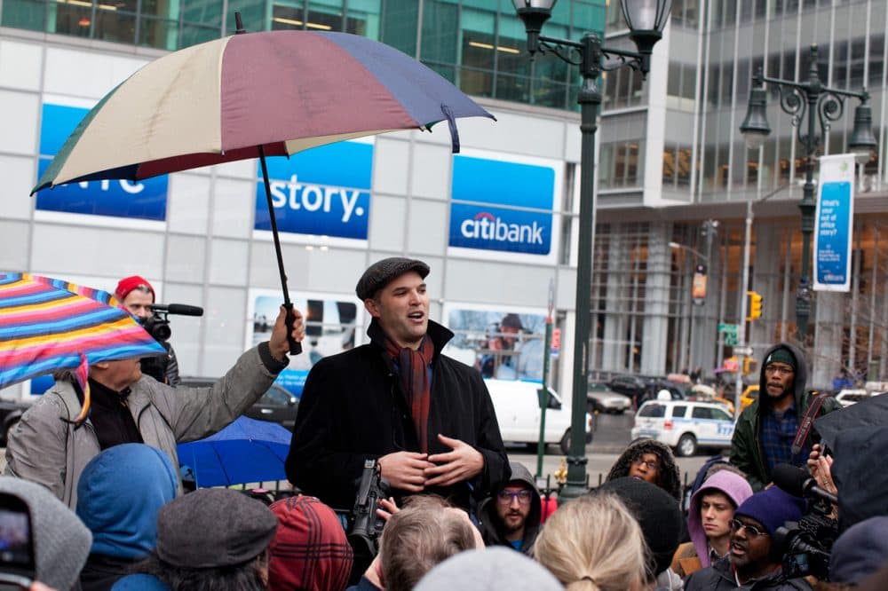 Author and journalist Matt Taibbi speaks to a crowd of Occupy Wall Street protestors after a march on the offices of pharmaceutical giant Pfizer, Wednesday, Feb. 29, 2012, in New York. (John Minchillo/AP)