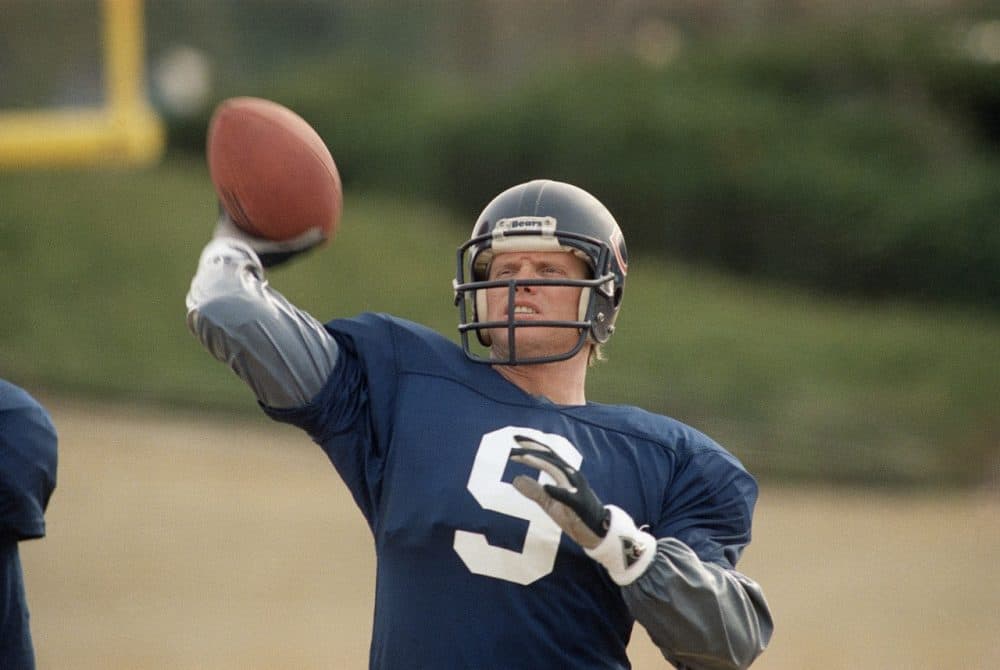 Chicago Bears quarterback Jim McMahon limbers up in a passing drill at the Atlanta Falcons training camp at Suwanee, Ga., Jan. 6, 1989. (Curtis Compton/AP)