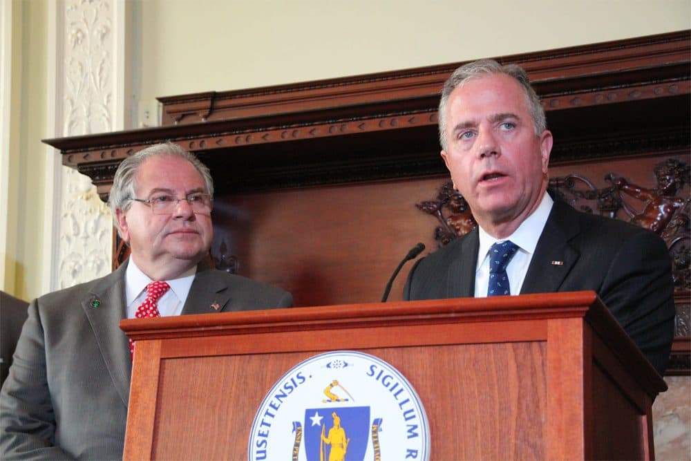 Public Safety Committee Co-Chairman Rep. Hank Naughton appears with House Speaker Robert DeLeo at the Tuesday morning unveiling of the House’s anti-gun violence bill. (State House News Service)