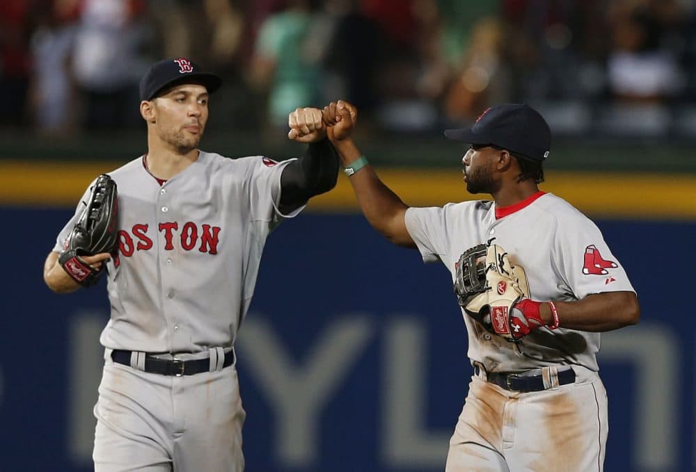 Boston Red Sox left fielder Grady Sizemore, left, and center fielder Jackie Bradley Jr. (25) celebrate after the Red Sox defeated the Atlanta Braves. (AP/John Bazemore)