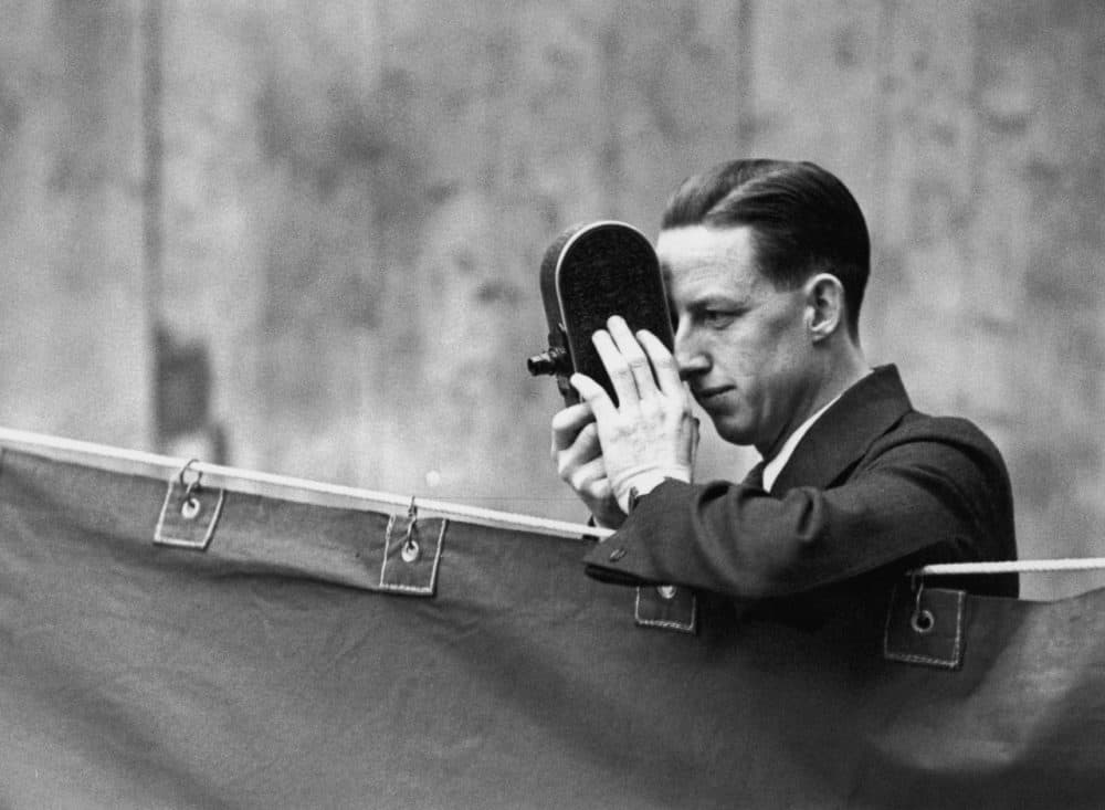 Jack Purcell, former Canadian badminton champion, films the All England Badminton Championship in 1931. Purcell had a recent Ottawa memorial mistakenly attributed to him. (Topical Press Agency/Hulton Archive/Getty Images)