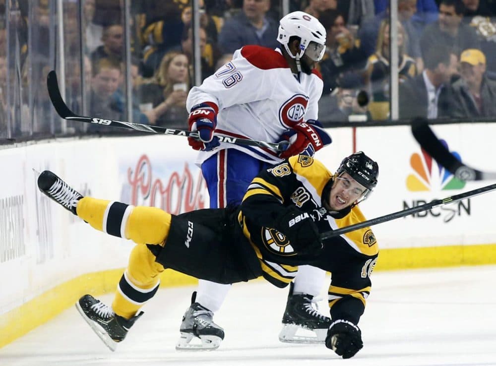 Canadiens defenseman P.K. Subban checks Bruins right winger Reilly Smith during the first period of Game 1 Thursday. (Elise Amendola/AP)