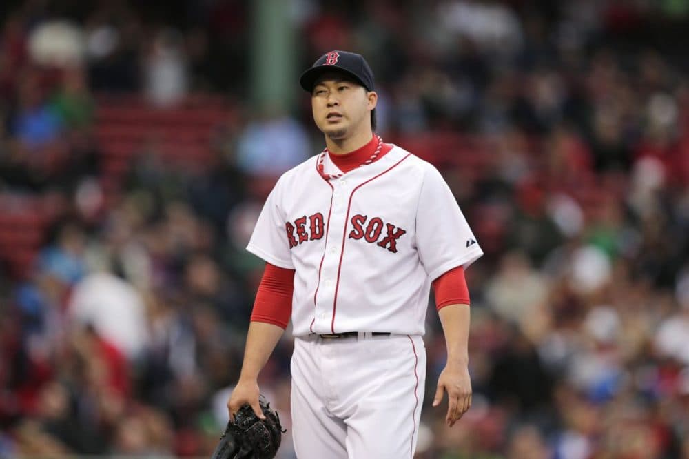 Boston Red Sox relief pitcher Junichi Tazawa after pitching to the Toronto Blue Jays during the ninth inning of a baseball game at Fenway Park, Thursday, May 22, 2014, in Boston. (Charles Krupa/AP)