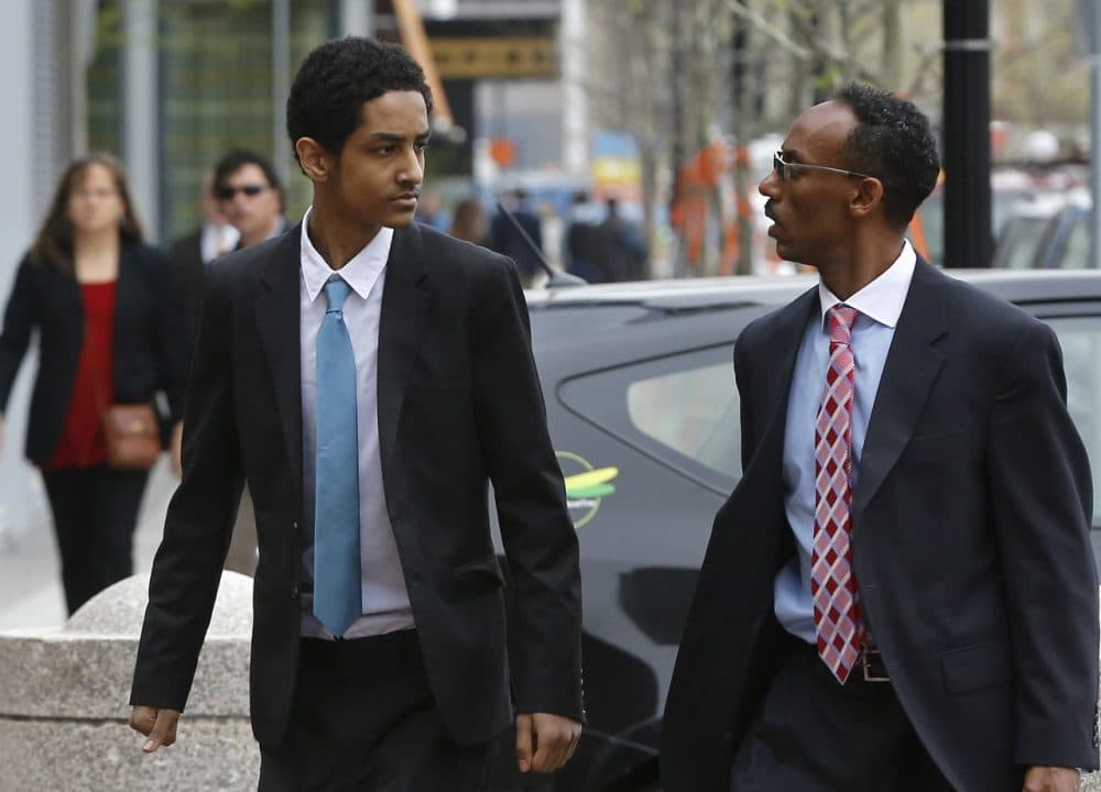 Robel Phillipos, a college friend of Boston Marathon bombing suspect Dzhokhar Tsarnaev, left, arrives at federal court with attorney Derege Demissie, before a hearing Thursday, May 15, 2014, in Boston. Phillipos, of Cambridge, Mass., is charged with lying to investigators after last year's fatal bombing. (AP)