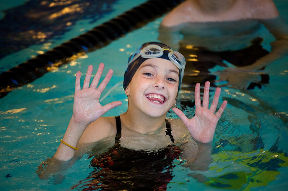 Swimmer Tori Merlino, 9, enjoys swim practice at Bosse Sports in Sudbury, Mass. 