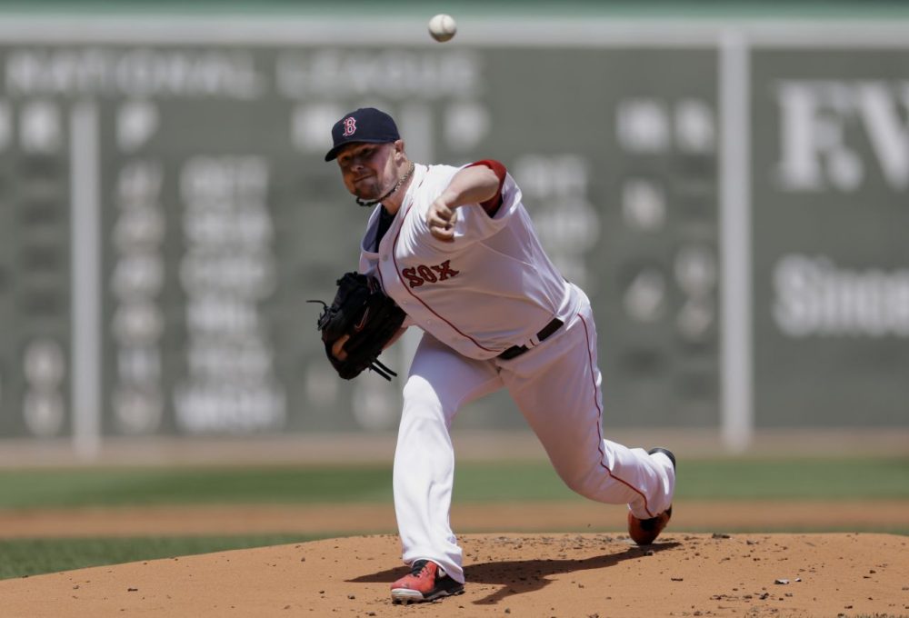 Jon Lester struck out 12 in seven shutout innings. (Steven Senne/AP)