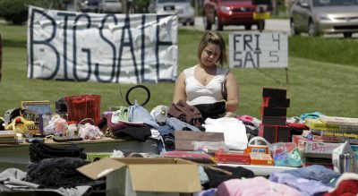 Doreen Vigue: Yard sales are the great equalizer. It’s the thrill of the hunt for some, a necessity for others and pure entertainment for all. (Michael Conroy/AP)
