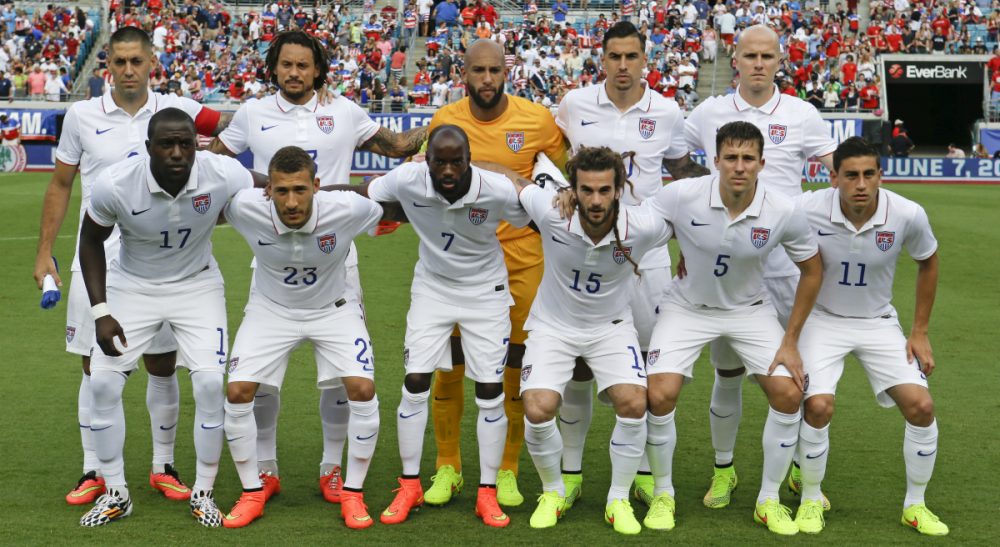 While the rest of the world is held captive by its collective interest, Americans sigh a definitive, &quot;meh.&quot; In this photo, the United States soccer team poses for a photo before an international friendly soccer match against Nigeria in Jacksonville, Fla., Saturday, June 7, 2014. (John Raoux/AP)