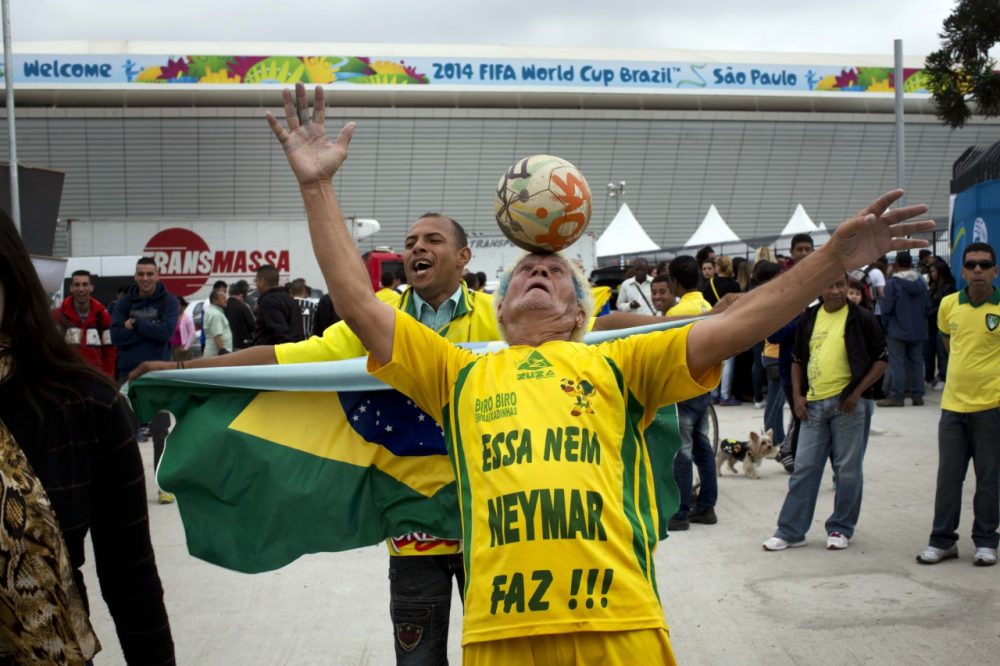 A man performs outside Arena Corinthians stadium in Sao Paulo. (Rodrigo Abd/AP)