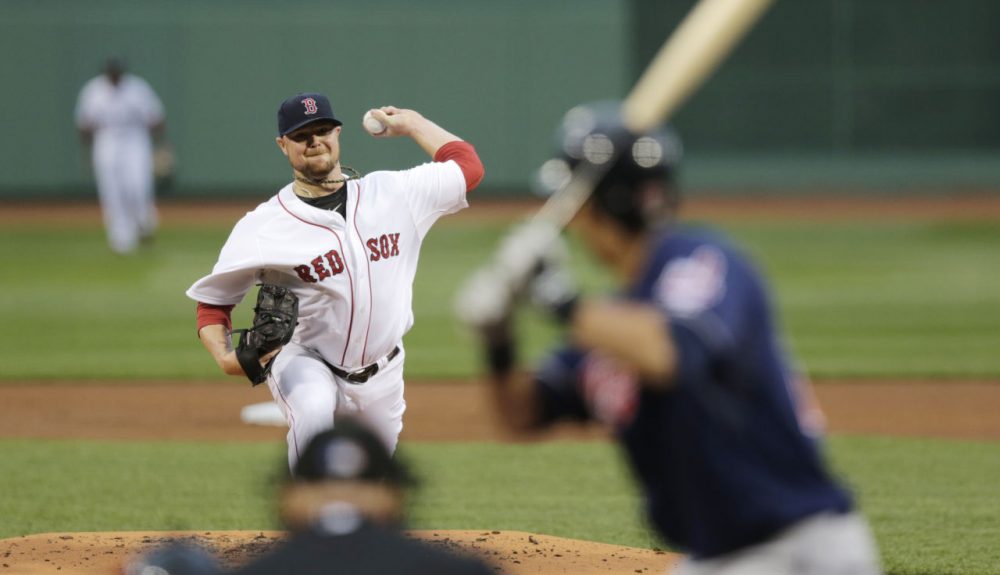 Boston Red Sox starting pitcher Jon Lester (31) delivers. (AP/Charles Krupa)