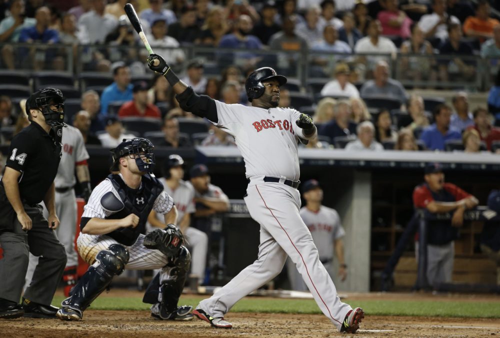Boston Red Sox designated hitter David Ortiz hits a third-inning, three-run home run off New York Yankees starting pitcher Chase Whitley. (AP/Kathy Willens)