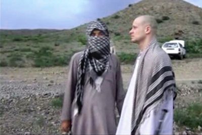In this image taken from video obtained from Voice Of Jihad Website, which has been authenticated based on its contents and other AP reporting, Sgt. Bowe Bergdahl, right, stands with a Taliban fighter in eastern Afghanistan. The Taliban on Wednesday, June 4, 2014, released a video showing the handover of Bergdahl to U.S. forces in eastern Afghanistan, touting the swap of the American soldier for five Taliban detainees from Guantanamo as a significant achievement for the insurgents. (AP)