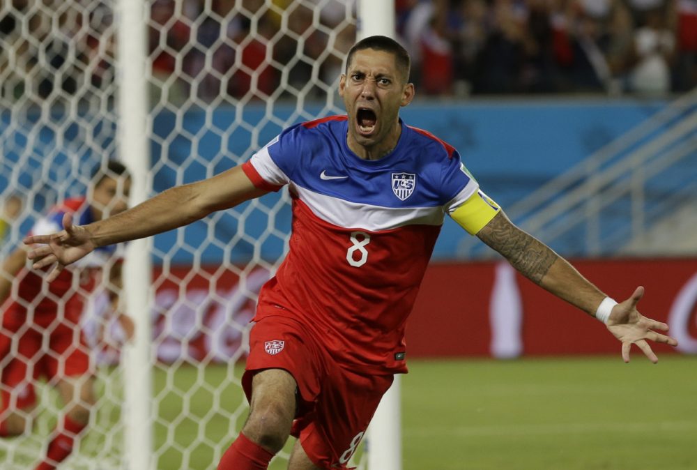 United States' Clint Dempsey celebrates after scoring the opening goal during the group G World Cup soccer match between Ghana and the United States at the Arena das Dunas in Natal, Brazil, Monday, June 16, 2014. The United States won the match 2-1. (AP)