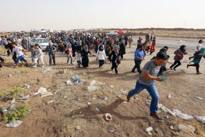 Refugees fleeing from Mosul head to the self-ruled northern Kurdish region in Irbil, Iraq, 350 kilometers (217 miles) north of Baghdad, Thursday, June 12, 2014. The Islamic State of Iraq and the Levant, the al-Qaida breakaway group, on Monday and Tuesday took over much of Mosul in Iraq and then swept into the city of Tikrit further south. (AP)