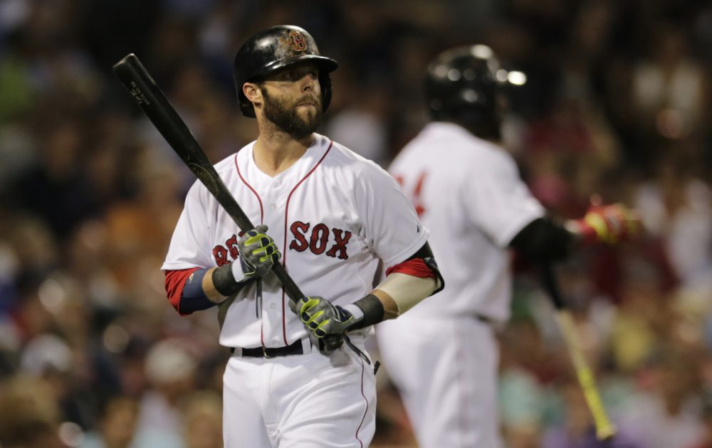 Boston Red Sox's Dustin Pedroia heads back to the dugout after striking out against Chicago Cubs starting pitcher Jake Arrieta. (Charles Krupa/AP)