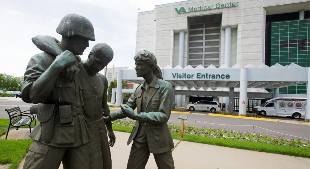The Department of Veterans Affairs was designed to care for veterans of another era's wars. Pictured: Three statues portraying a wounded soldier being helped, on the grounds of the Minneapolis VA Hospital, Monday, June 9, 2014. An audit of 731 VA hospitals and clinics found that a 14-day goal for seeing first-time patients was unattainable given increasing demand for health care. (Jim Mone/AP)