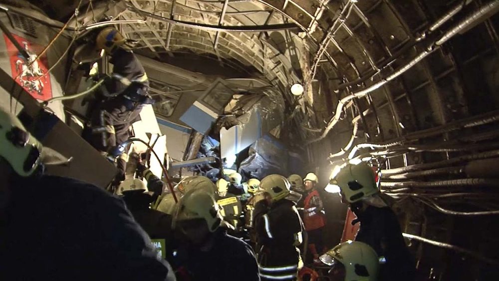 In this frame grab from video provided by the Russian Ministry for Emergency Situations, rescue teams work inside the tunnel in Moscow where subway train derailed Tuesday during rush hour, killing at least 20 people and sending 150 others to the hospital, many with serious injuries, Russian officials said. (Russian Emergency Situation Ministry/AP)