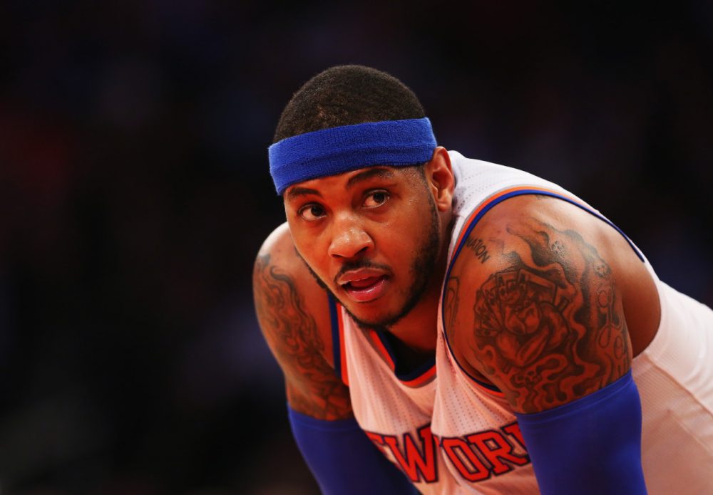 After weighing offers from around the league, Carmelo Anthony agreed to a  five-year, $124 million contract with the Knicks. (Al Bello/Getty Images)