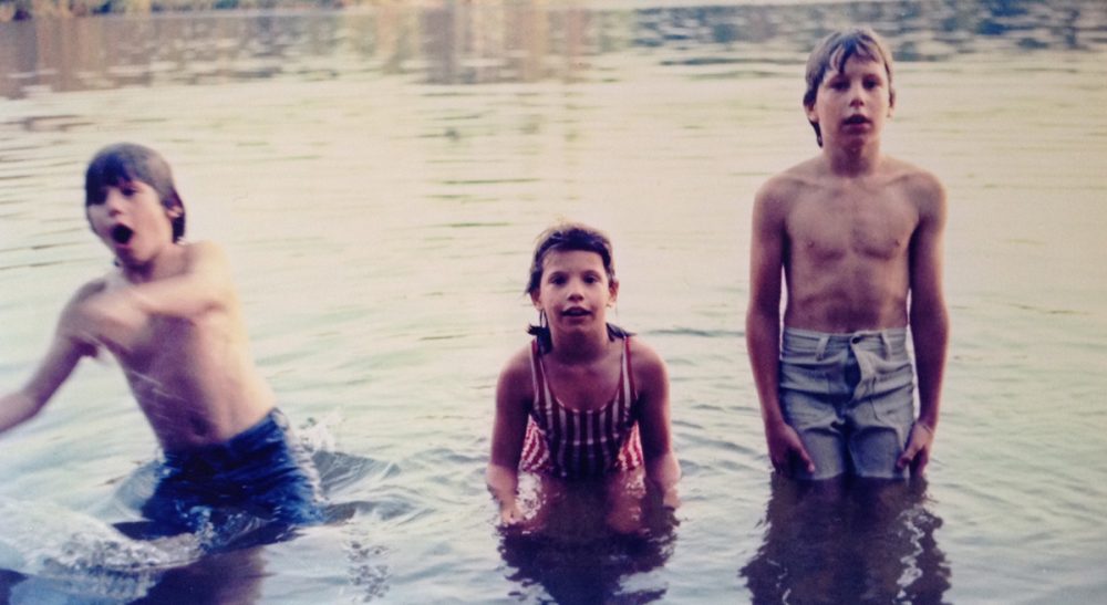 What navel gazing -- literally -- taught one boy about the value of being different. Pictured: The author (right) desperately trying to hide his outie at Wheelwright Pond in Lee, NH, c. 1977, with his siblings. (Sarah Gilsdorf/Courtesy)