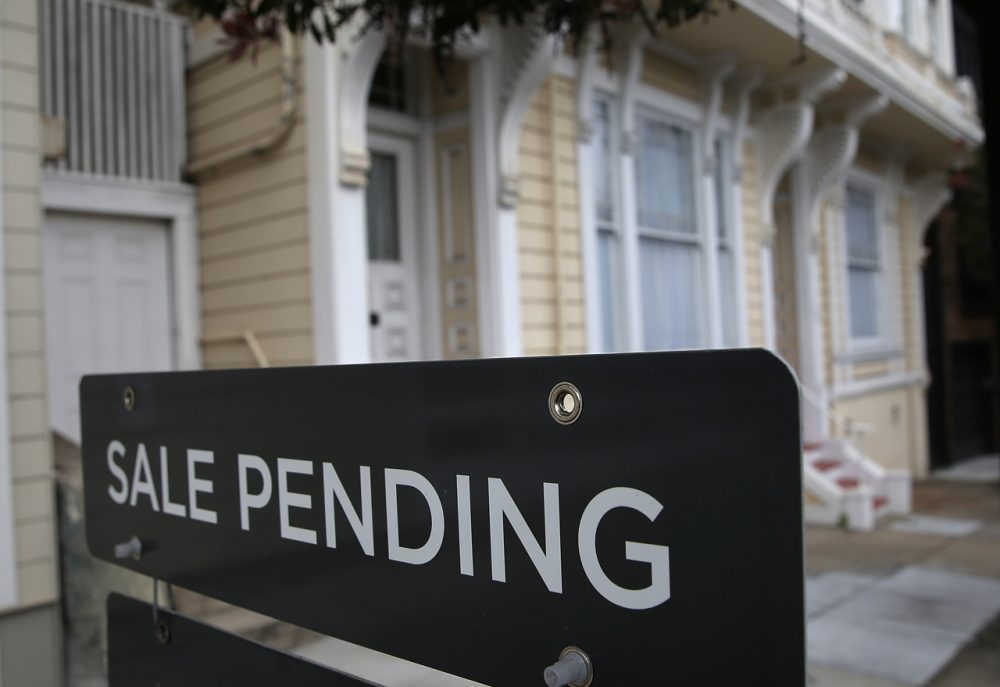 A sale pending sign is posted in front of a home for sale on July 17, 2014 in San Francisco, California. (Justin Sullivan/Getty Images)