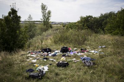  Luggage and personal belongings from Malaysia Airlines flight MH17 lie in a field on July 20, 2014 in Grabovo, Ukraine. Malaysia Airlines flight MH17 was travelling from Amsterdam to Kuala Lumpur when it crashed killing all 298 on board including 80 children. The aircraft was allegedly shot down by a missile and investigations continue over the perpetrators of the attack.  (Rob Stothard/Getty Images)