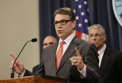 Texas Gov. Rick Perry announces he is deploying up to 1,000 National Guard troops over the next month to the Texas-Mexico border to combat criminals that Republican state leaders say are exploiting a surge of children and families entering the U.S. illegally, July 21, 2014, in Austin, Texas. (Eric Gay/AP)