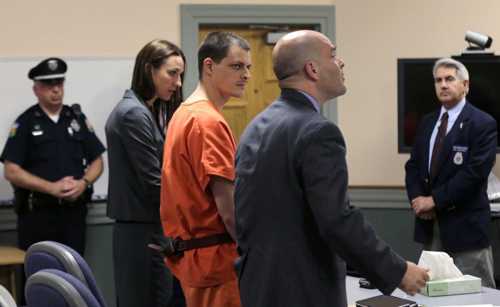 Nathaniel Kibby stands during a July arraignment. (Charles Krupa/AP)