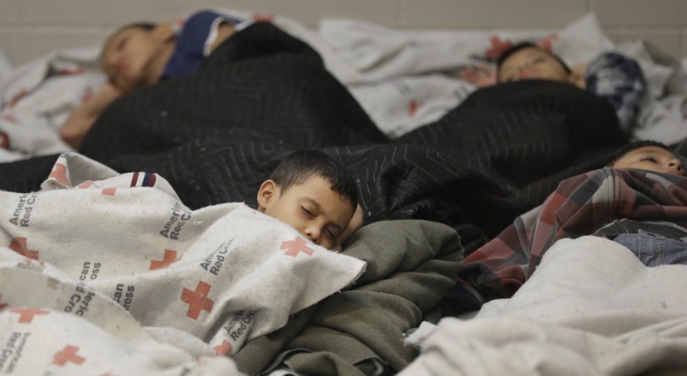 Carol Rose and Adriana Lafaille: &quot;With Governor [Deval] Patrick clearing the way for hundreds of child migrants to be brought to shelters in the Commonwealth, it is essential that the federal government act to protect their right to legal representation.&quot; Pictured: June 18, 2014: Child detainees sleep in a holding cell at a U.S. Customs and Border Protection processing facility in Brownsville,Texas. For years, children from Central America traveling alone, and immigrants who prove they have a credible fear of returning home, have been entitled to a hearing before an immigration judge. (Eric Gay /AP)