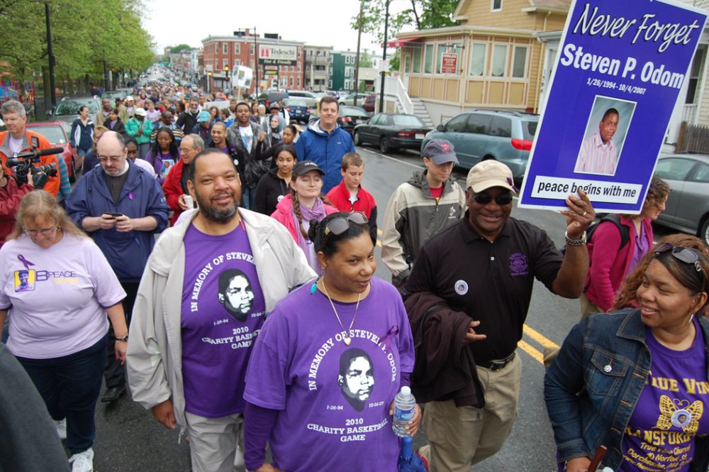 Thousands marched down Dorchester Avenue on May 12 in the annual Mother’s Day Walk for Peace, many of them families remembering loved ones murdered in Boston and calling for an end to gun violence in the city. (WBUR/Greg Cook)