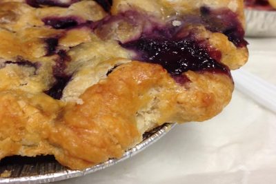 A closeup of piemaker Beth Howard's mixed berry pie in the On Point studios. (Nick Andersen / WBUR)