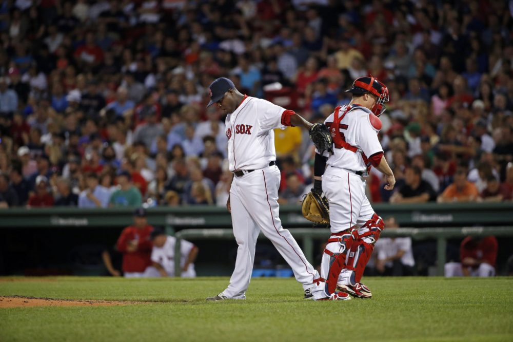Red Sox starting pitcher Rubby De La Rosa pats Boston Red Sox catcher Christian Vazquez. (AP/Elise Amendola)