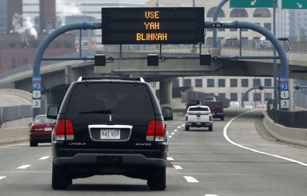 An electronic highway sign is seen on Interstate 93 in Boston last May. (Michael Dwyer/AP)