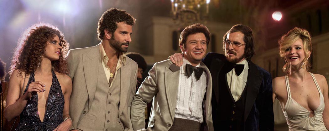 From left, Amy Adams, Bradley Cooper, Jeremy Renner, Christian Bale and Jennifer Lawrence in a scene from “American Hustle.” (AP/Sony)