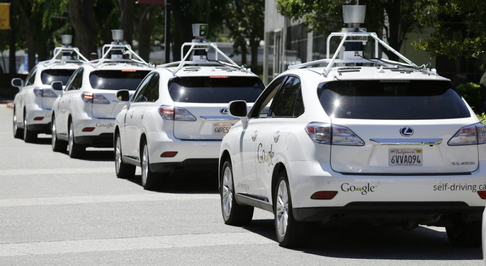 Tom LeCompte: &quot;Even if engineers can teach robot cars to integrate with Boston drivers, what’s the fun of cutting off a robotic car or throwing it the finger.&quot; Pictured: In this photo taken Wednesday, May 14, 2014, a row of Google self-driving cars are shown outside the Computer History Museum in Mountain View, Calif.(Eric Risberg/AP)