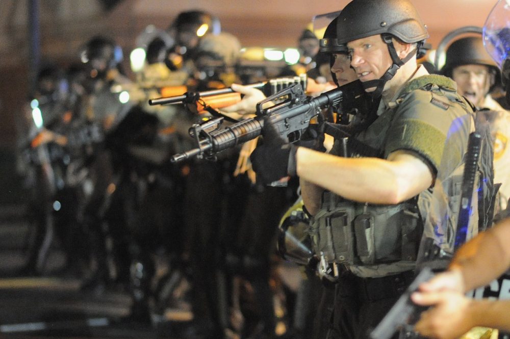 The protests in Ferguson brought attention to police departments with military weapons. Less known are educational institutions which received military weapons through the same Department of Defense program. (Michael B. Thomas/AFP/Getty Images)