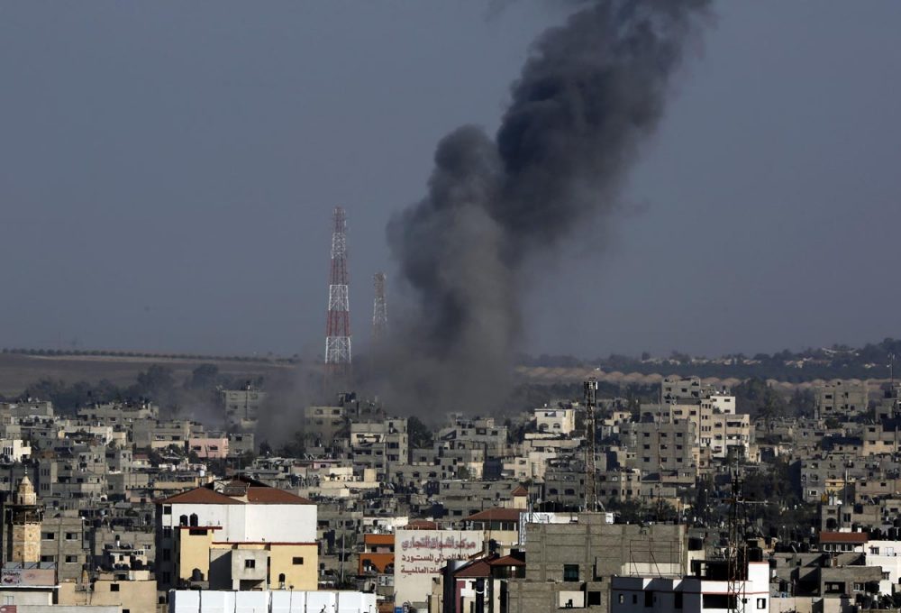 Smoke rises after an Israeli strike hits Gaza City in the northern Gaza Strip on Tuesday. (Adel Hana/AP)
