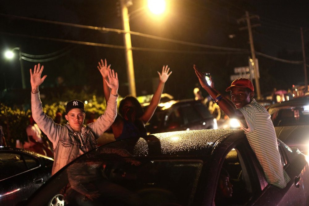Demonstrators raise their hands as they protest the shooting death of 18-year-old Michael Brown on August 15, 2014 in Ferguson, Missouri. Michael Brown was killed in broad daylight on August 9. (Joshua LOTT/AFP/Getty Images)