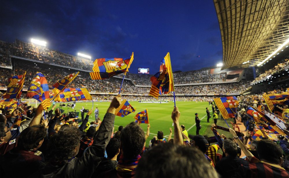 Spanish clubs Real Madrid and Barcelona are doing just fine, but other pro soccer teams in Spain are struggling financially. (Denis Doyle/Getty Images)