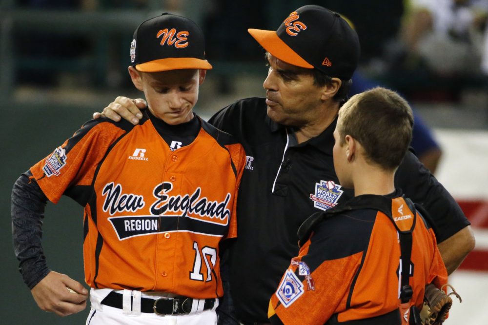 Cumberland manager David Belisle talks with pitcher CJ Davock, left, and catcher Trey Bourque during the fifth inning of the game against Chicago at the Little League World Series on Monday. (AP/Gene J. Puskar)