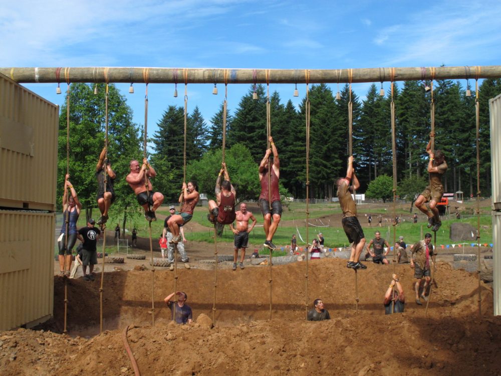 Competitors tackle an obstacle during the Pacific Northwest &quot;Spartan Sprint&quot; on Saturday, June 16, 2012, in Washougal, Wash.(AP/Rachel La Corte)