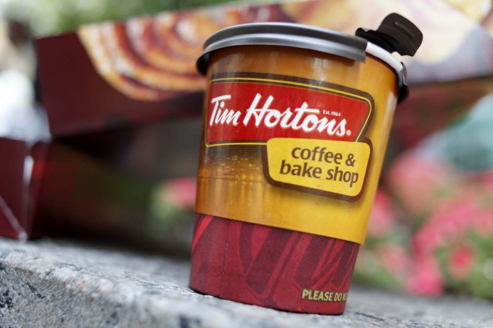 A Tim Hortons' coffee cup is seen in New York, Wednesday, July 22, 2009.  (AP)