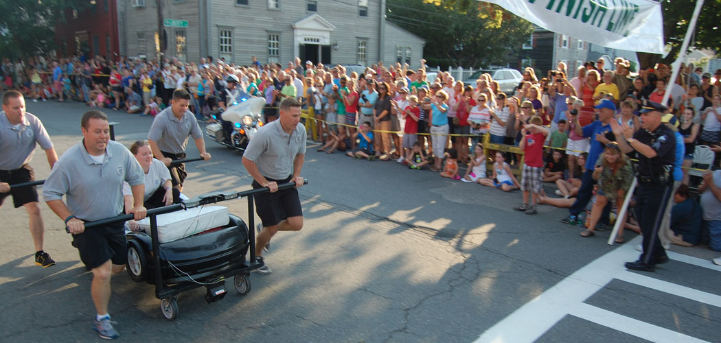 The Newburyport police team closes on the finish line. (Greg Cook)