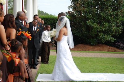 A couple gets married in front of family and friends in this 2009 photo. (Julian Thomas / Flickr)