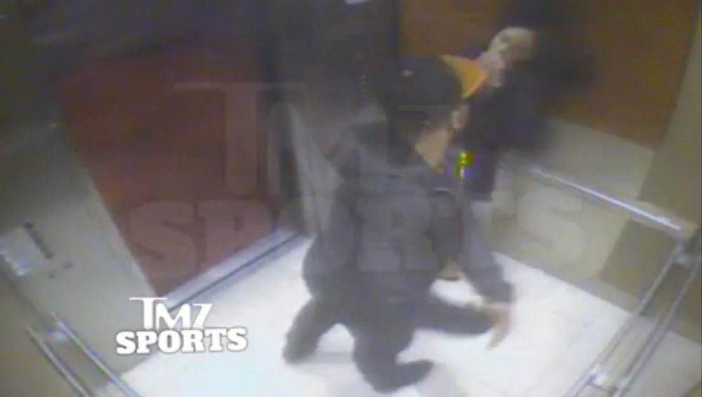 In this still image taken from a hotel security video released by TMZ Sports, Baltimore Ravens running back Ray Rice punches his fiancee, Janay Palmer, in an elevator at the Revel casino in Atlantic City, N.J., in February 2014. (AP)